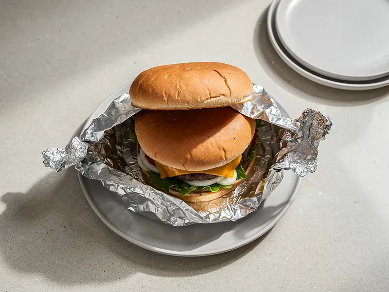 Step 6: Close with the crown bun and wrap in foil for 1 minute to let the steam meld the