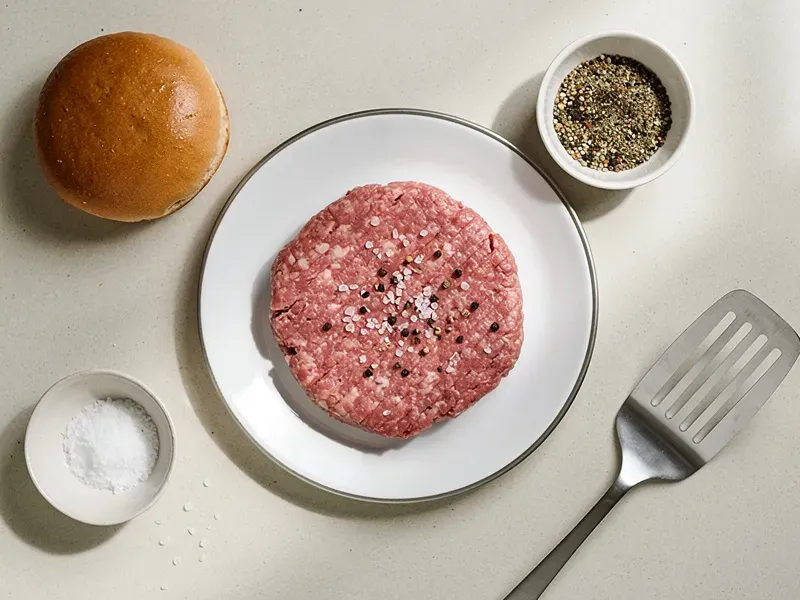 Step 2: Form the ground beef into a flat, thin patty slightly larger than the bun (it wi